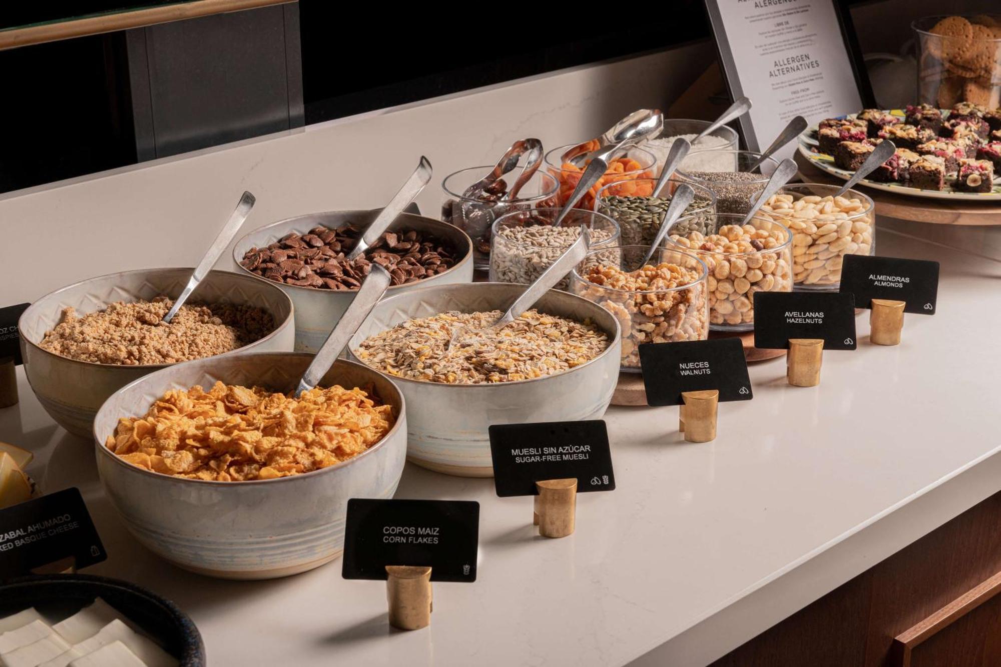 Radisson Collection Bilbao Hotel Exterior photo A selection of cereals at a buffet